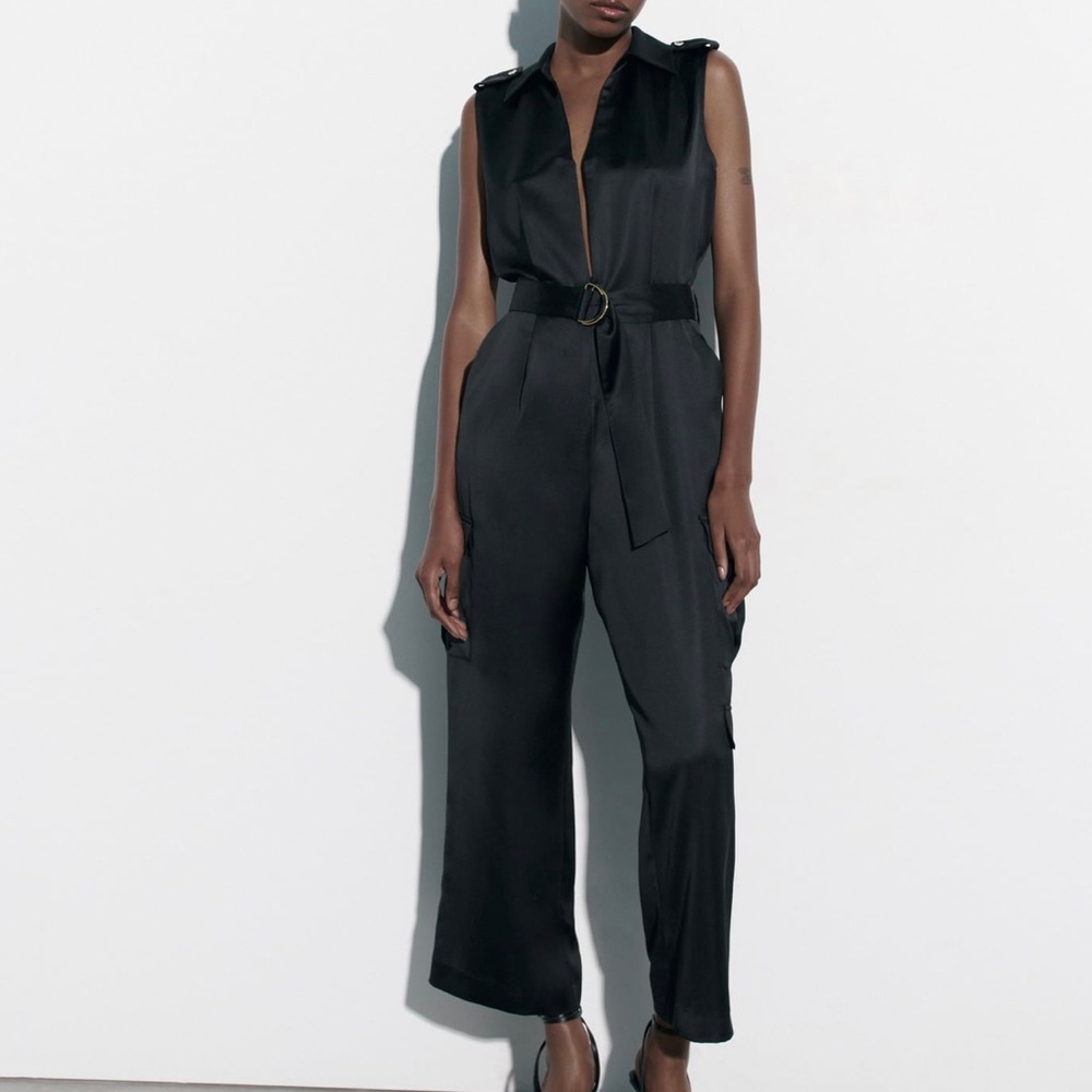 Gorgeous black jumpsuit. Never worn!!